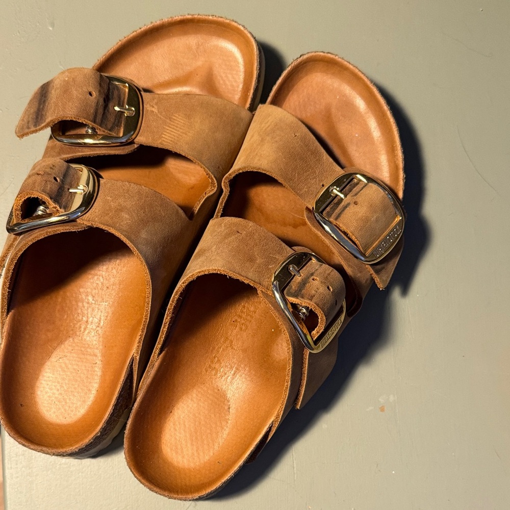 Birkenstocks with gold buckles